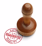 Red quality guarantee stamp with wooden stamper isolated on white background..jpg